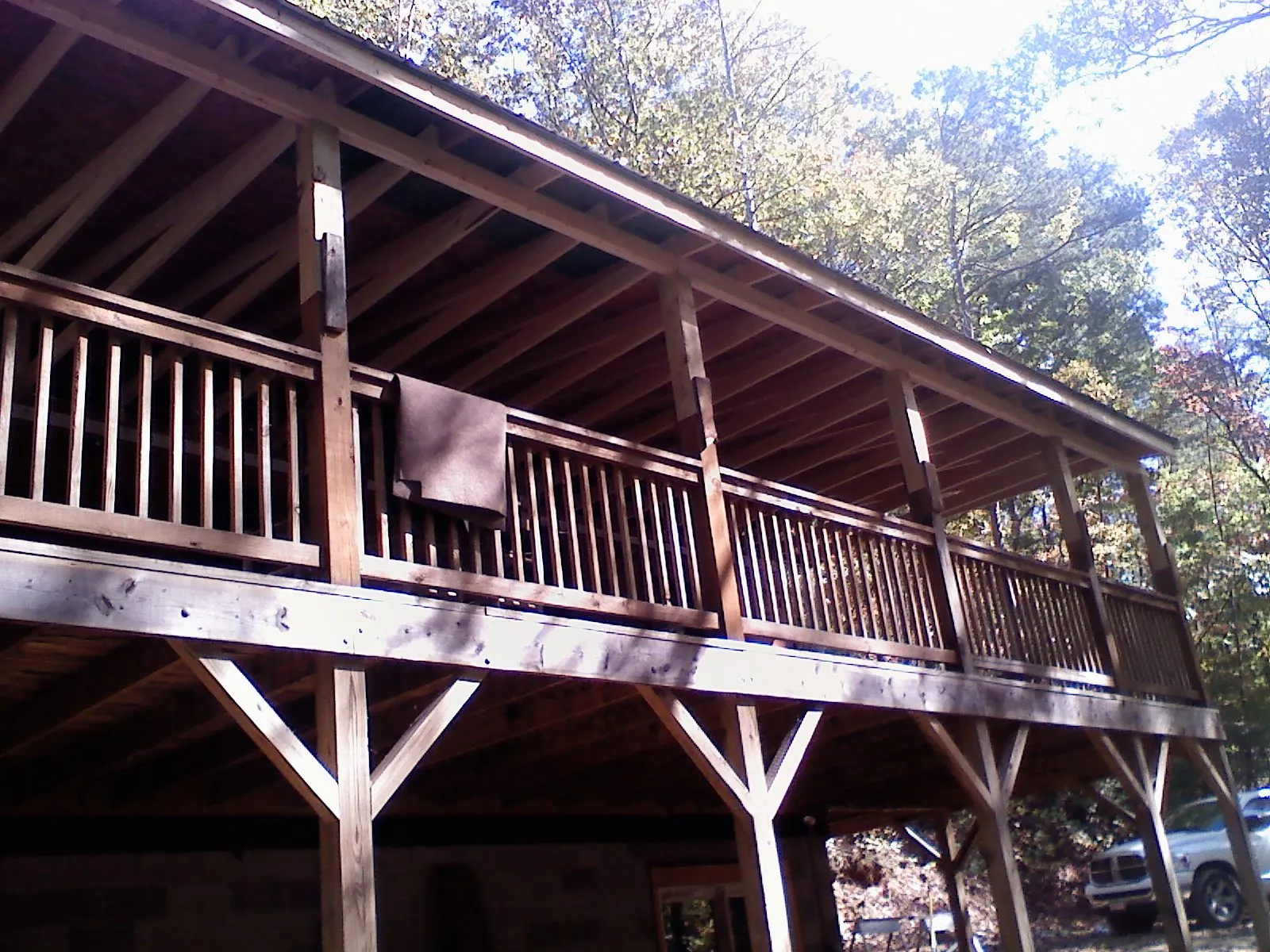 Timber framing under a new elevated porch and deck — Roof Leak Repair in Mound City by Roofing Brothers